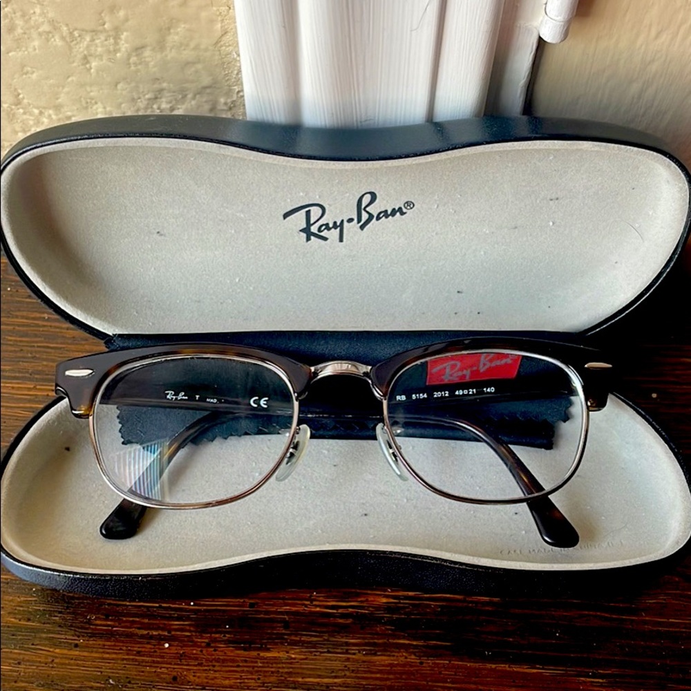 Ray-Ban prescription glasses; easy to bring to optometrist to switch out lenses